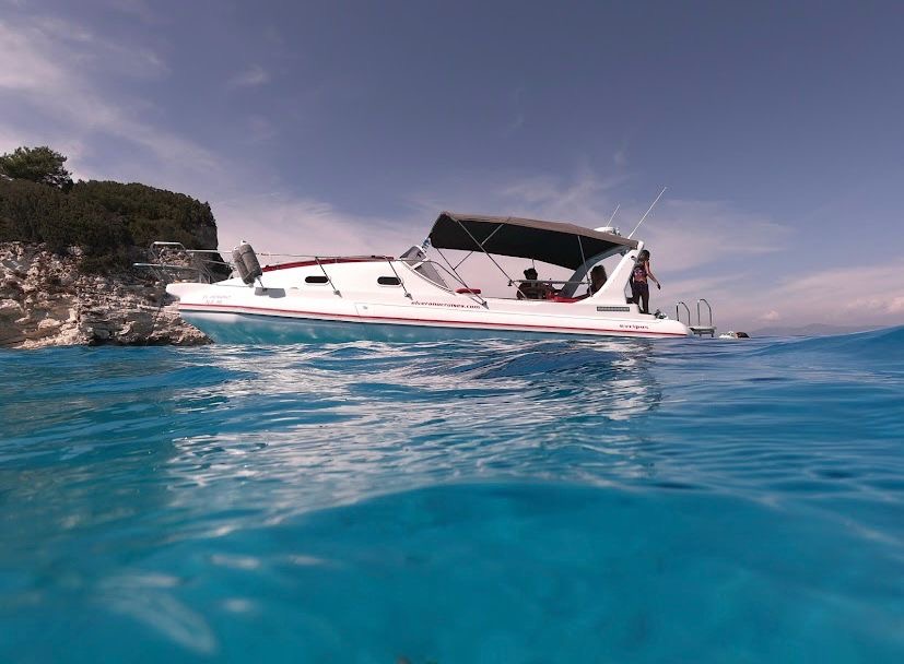 Zen Explorer anchored on turquoise water