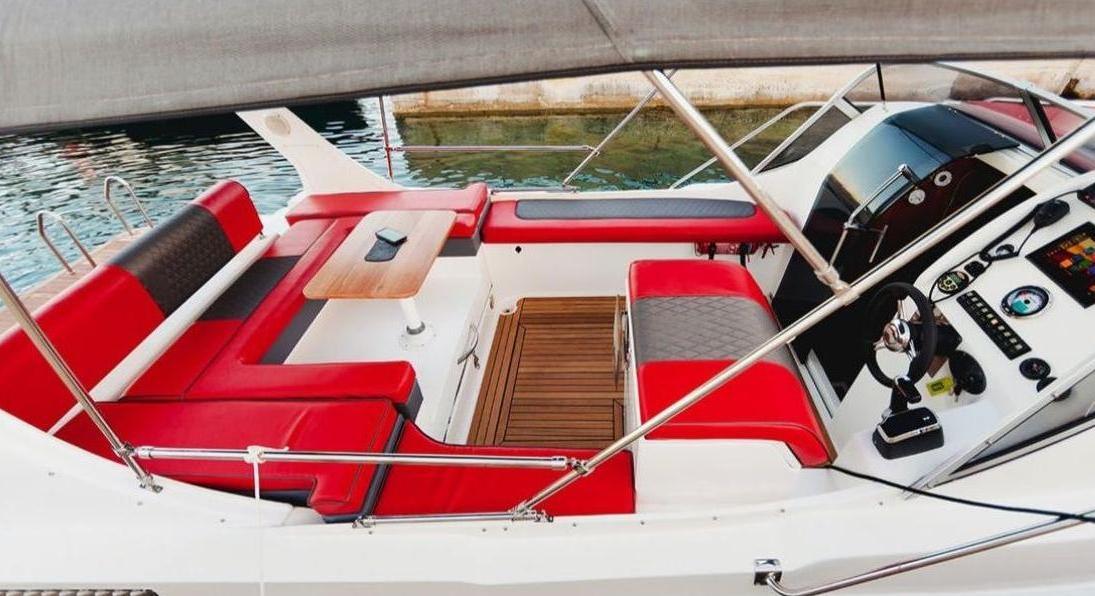 Interior of Zen Explorer's cockpit with red seats